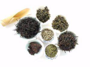 tea-cup-green-chinese-herb-soil